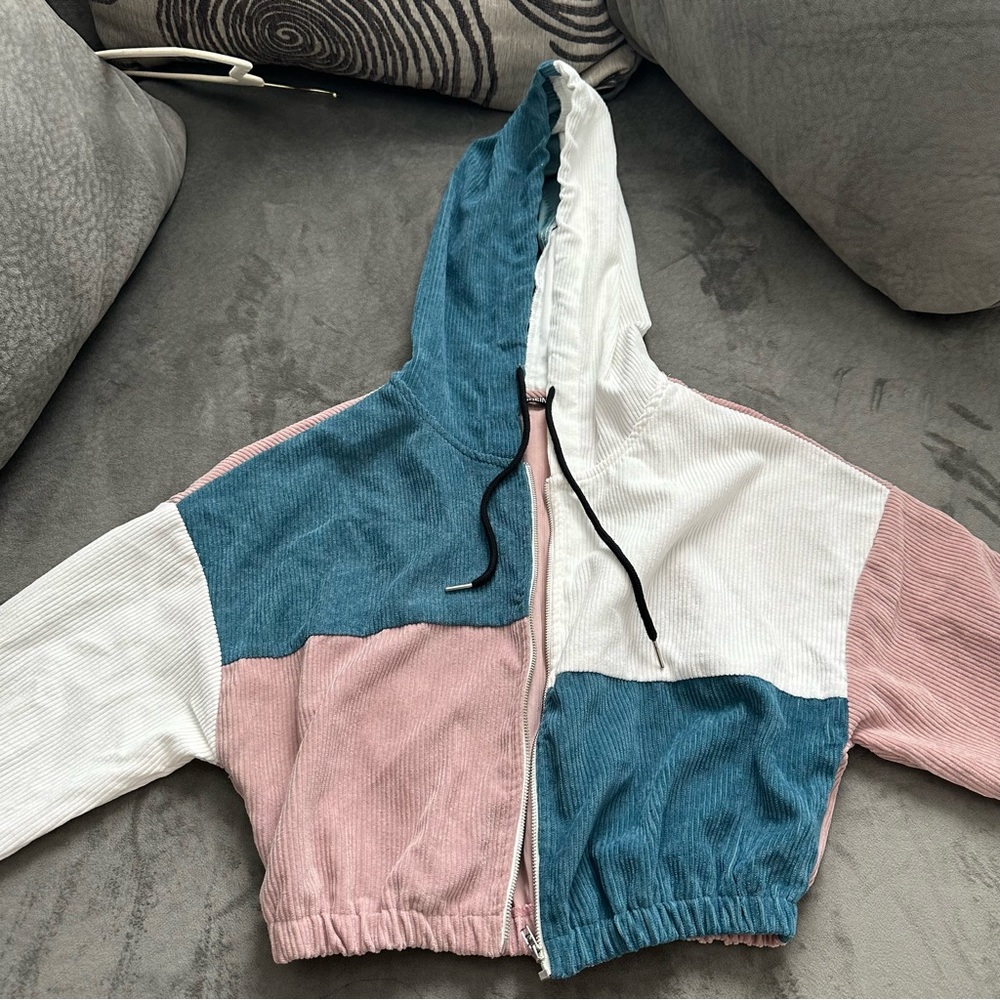 A vintage, cropped, SHEIN hoodie, in a size medium.